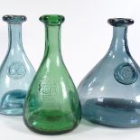 A blue Studio glass seal-front bottle decanter, height 22cm, and 2 other Studio glass bottles (3)
