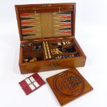 An Antique mahogany games compendium, the interior fitted with chess, solitaire, draughts and