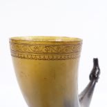 A European drinking horn with horse design finial, and carved rim, length 24cm