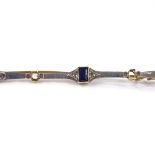 An unmarked gold sapphire and diamond bar brooch, length 74.6mm, 5.9g (2 sapphires missing) (A/F)