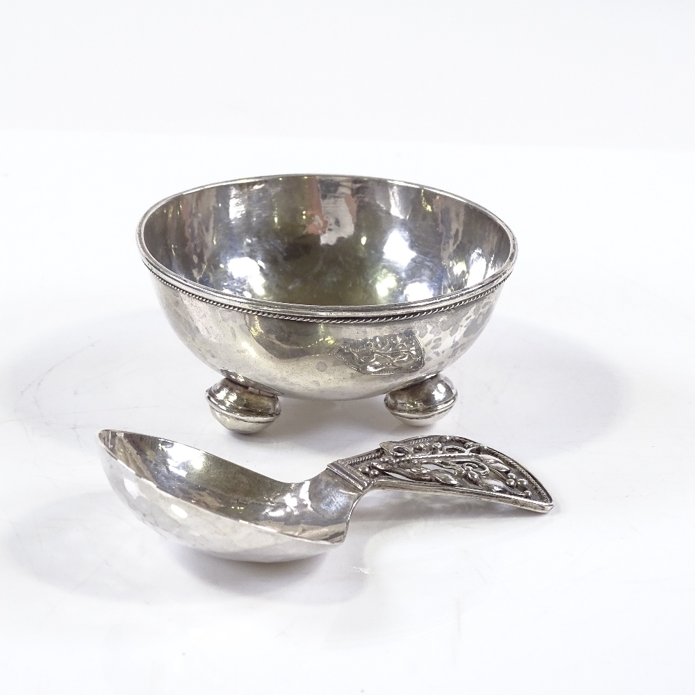 An Arts and Crafts silver caddy spoon and bowl, with pierced stylised floral handle, unmarked but - Image 2 of 3