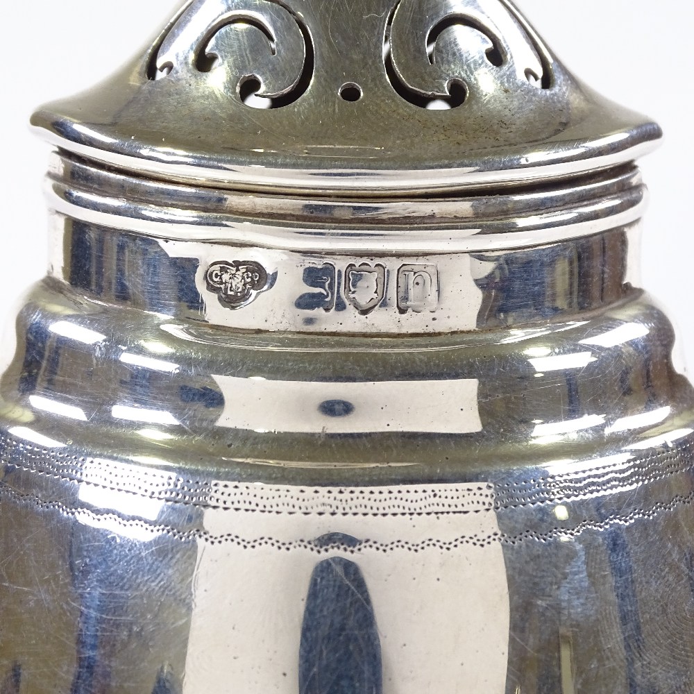 A navette-shaped silver sugar shaker, with Adams style decoration, by Goldsmiths and Silversmiths Co - Image 2 of 3