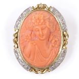 A relief carved coral cameo pendant/brooch, depicting female portrait, in unmarked gold frame,