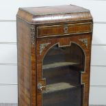 A French 19th century kingwood and walnut cabinet of small size, with ormolu mouldings and mounts,