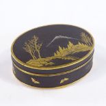 A Japanese Komai gilt-metal and enamel oval box, with landscape scene to the lid, signed under base,