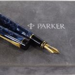 A Parker Duofold Centennial blue marbled fountain pen with 18ct gold nib, boxed