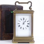 A French brass-cased carriage clock, early 20th century, 8-day movement, case height 12cm, in