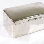 A rectangular silver cigarette box, with interior gilt lid, by A&J Zimmerman Ltd, hallmarks