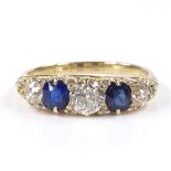 An 18ct gold 5-stone sapphire and diamond half-hoop ring, with small diamond spacers and foliate