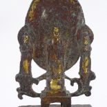 A Chinese verdigris bronze shrine, surmounted by Buddha figures, height 17cm
