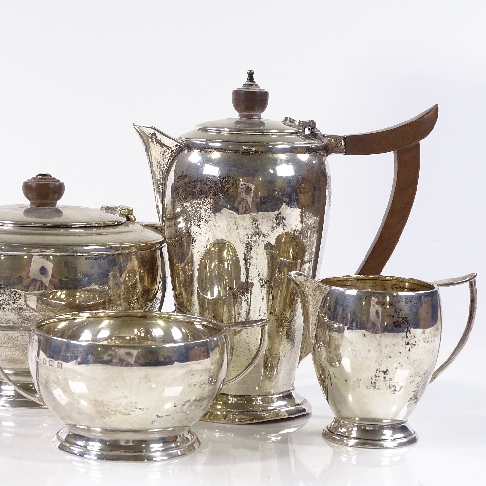 A 4-piece silver tea set, of stepped circular form, by Deakin & Francis Ltd, hallmarks Birmingham