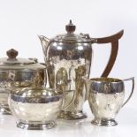 A 4-piece silver tea set, of stepped circular form, by Deakin & Francis Ltd, hallmarks Birmingham