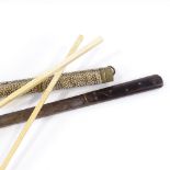 An Oriental born-handled eating set, including ivory chopsticks, in brass-mounted shagreen case,
