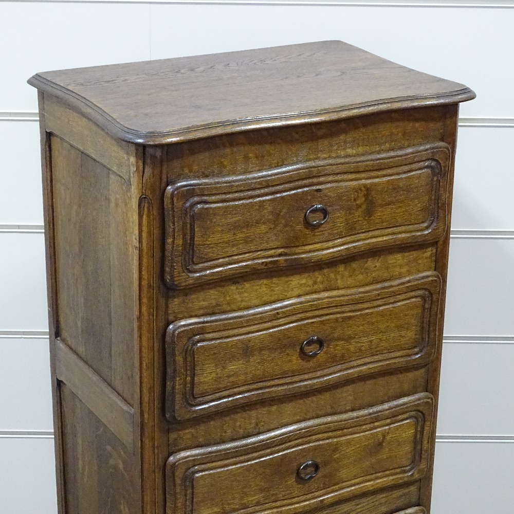 A French narrow oak chest of 4 drawers, with shaped top and carved drawer fronts, width 20.5", - Image 2 of 8