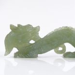 A Chinese carved jade dragon, length 15cm