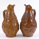 2 similar French salt glazed stoneware jugs, 1 with raised relief grapevine designs, 1 with text,
