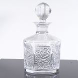 A Lalique glass decanter and stopper, with frosted relief-moulded grapevine design panels, height