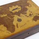 A Second War Period marquetry inlaid box, the lid decorated with a map of the world and aircraft,