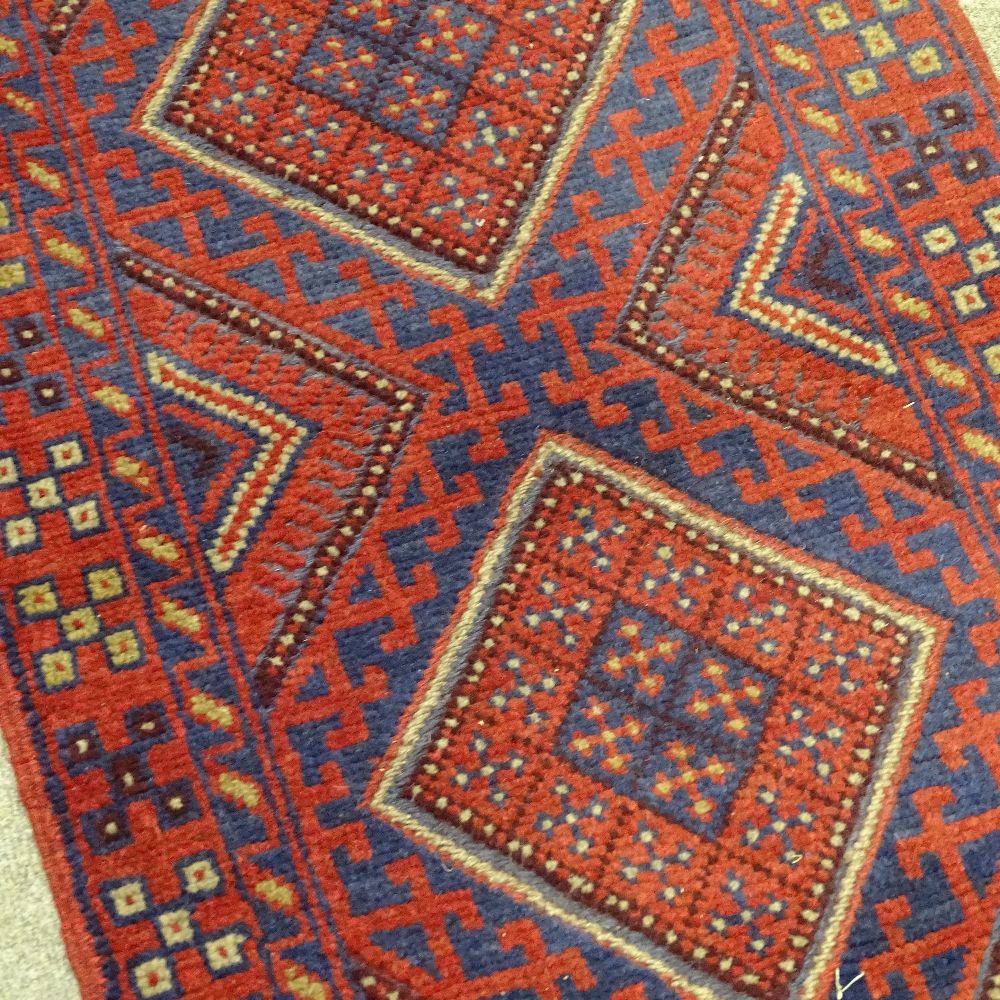 A handmade Meshwani runner, blue and red ground, 7'11" x 2' - Image 3 of 4