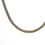 A 9ct gold textured necklace, length 43cm, 14.1g