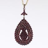 A large Victorian faceted garnet and garnet gold pendant necklace, on gilt-metal chain, pendant
