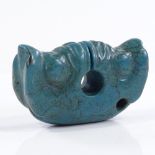 A Chinese carved and pierced blue stone pendant, length 7cm