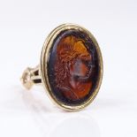 An unmarked gold intaglio glass seal fob, depicting Classical male portrait, signed, panel