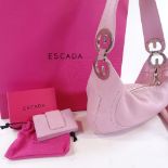 An Escada pink leather handbag and purse, with dust bags and boxes