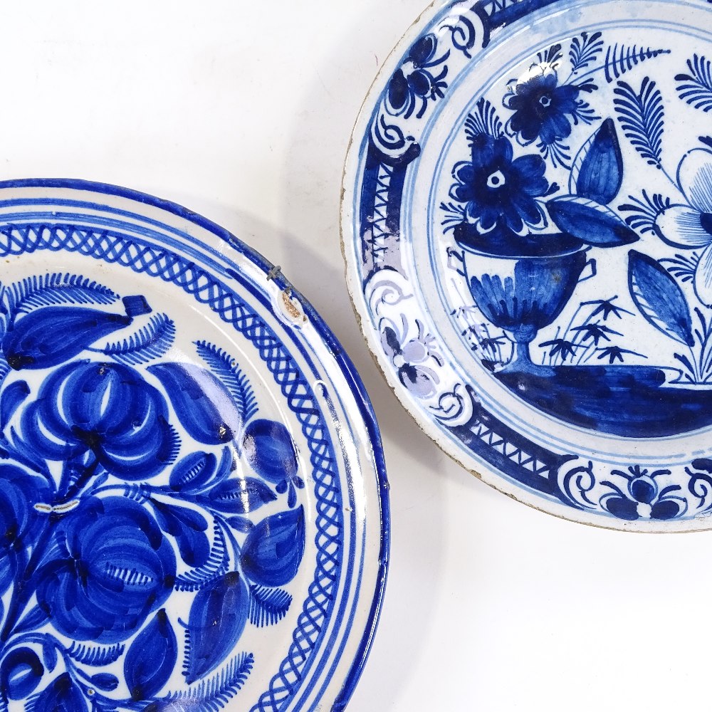 A Delft tin-glazed blue and white pottery bowl, 31cm diameter, and a similar blue and white dish,