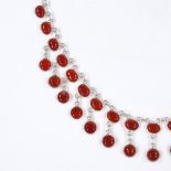 A sterling silver and cabochon carnelian collar necklace, length 39cm, 17.8g