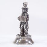 A novelty Spanish silver miniature figure, depicting a street musician, height 10.5cm, 2.8oz