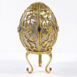 A Theo Faberge style St Petersburg Collection Egg Emergence of Spring, silver and enamel egg...