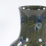 A Moorcroft Pottery baluster vase circa 1900, spring flower designs, impressed marks Moorcroft