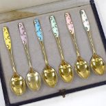 A set of 6 Danish sterling silver-gilt and coloured enamel coffee spoons, by Frigast