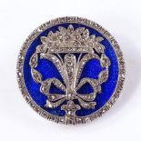 An Antique unmarked gold diamond and blue enamel circular brooch, depicting spray of flowers and