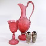 A ruby glass ewer with engraved grapevine decoration, height 37cm, matching goblet (stem A/F), and a