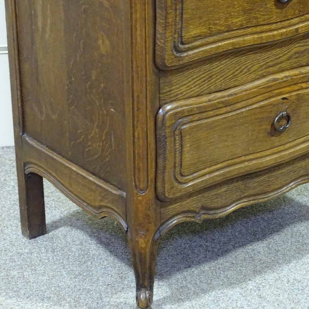 A French narrow oak chest of 4 drawers, with shaped top and carved drawer fronts, width 20.5", - Image 7 of 8