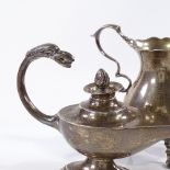 A silver Aladdin style oil lamp, by James Deakin & Sons, hallmarks Birmingham 1901, length 15cm,