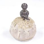 A novelty silver-mounted crinoline lady pin cushion, by Saunders & Shepherd, hallmarks Birmingham