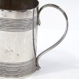 A George III silver christening mug, of tapered cylindrical form, with 2 reeded bands, by Solomon