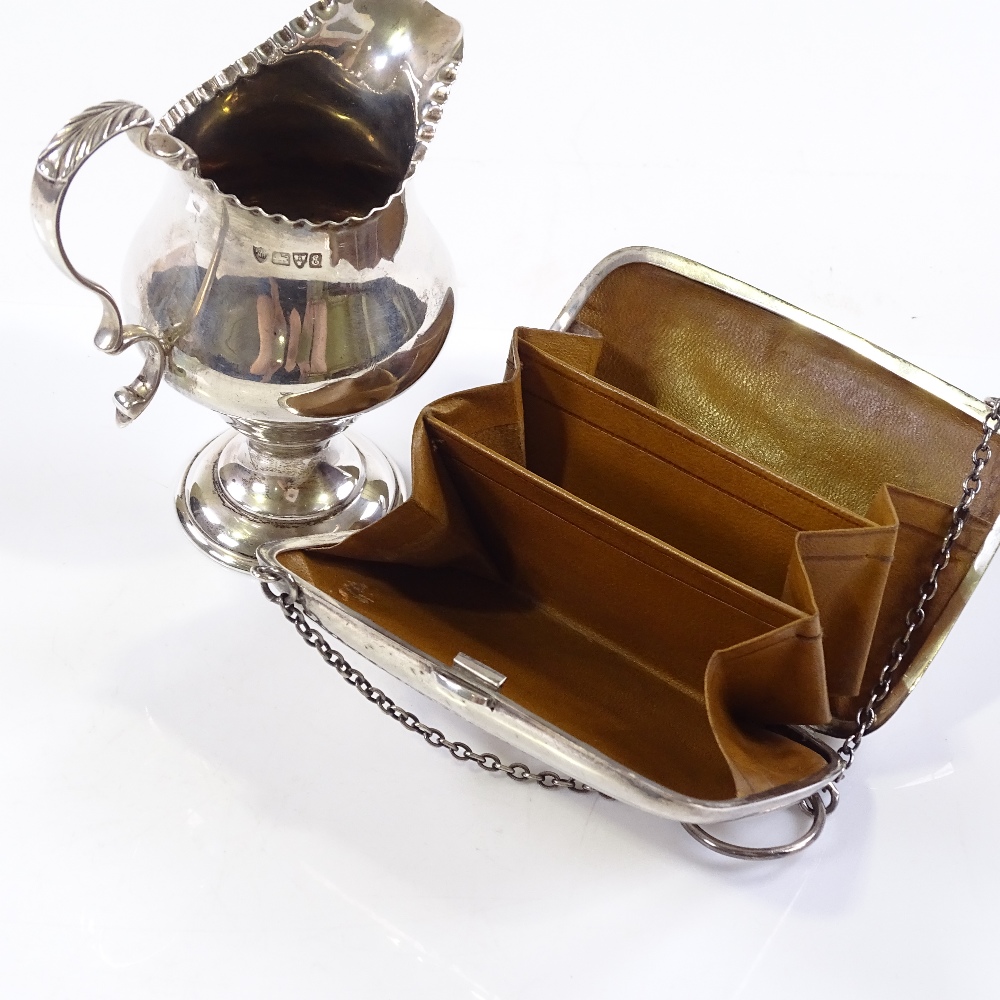 A silver-mounted evening purse by Boots Pure Drug Company, hallmarks Birmingham 1918, length 10cm, - Image 3 of 3