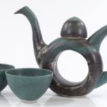 A Studio pottery hollow centre teapot and 2 tea bowls, maker's marks SP, teapot height 18cm