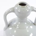 A Chinese white glaze porcelain 2-handled jar with incised decoration, incised marks under base,