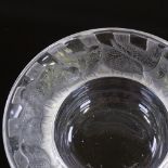 A Rene Lalique circular glass dish with relief-moulded garden bird decorated border, engraved