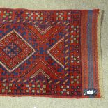 A handmade Meshwani runner, blue and red ground, 7'11" x 2'