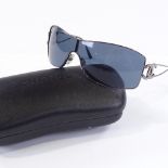 A pair of Chanel lady's sunglasses, cased