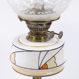 An Art Deco Duplex brass oil lamp, with stylised painted opaque glass font and etched glass shade,