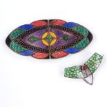 An Art Nouveau sterling silver enamel and red stone stylised brooch, together with an Art Deco
