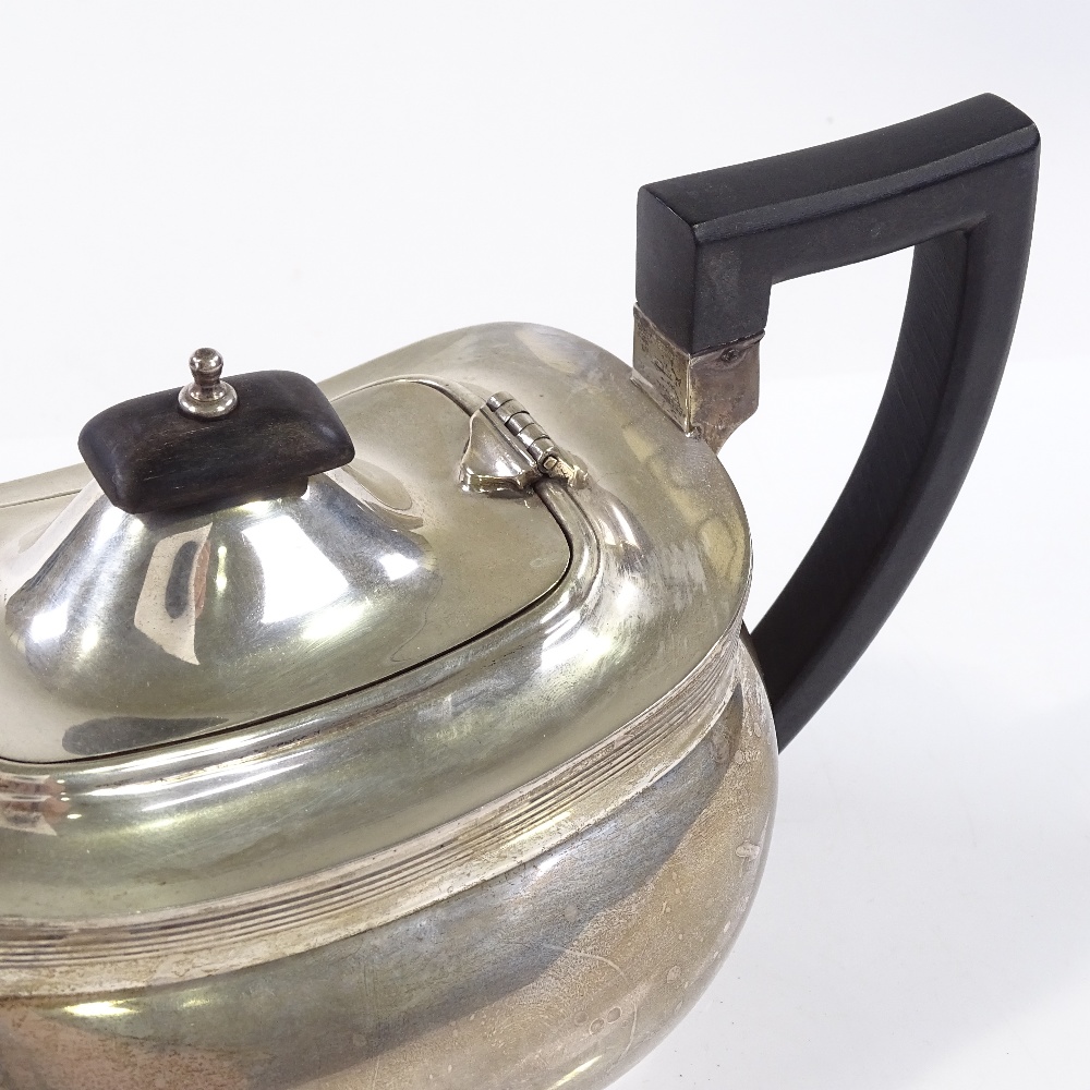 An oval silver teapot, of bulbous form, by Barker Brothers Silver Ltd, hallmarks Birmingham 1932, - Image 3 of 3