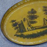 An Antique Toleware oval tea tray, with hand painted Continental landscape scene, 25" across